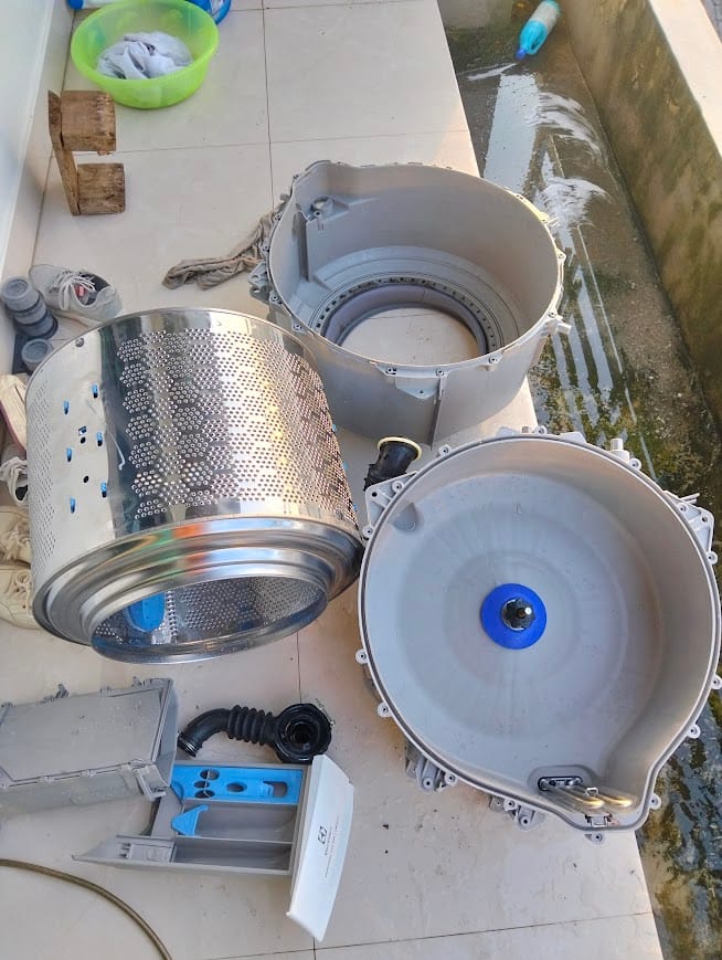 vệ sinh máy giặt cửa ngang inverter