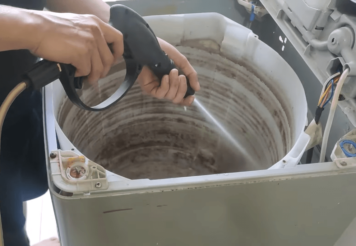 vệ sinh máy giặt cửa đứng không tháo lồng